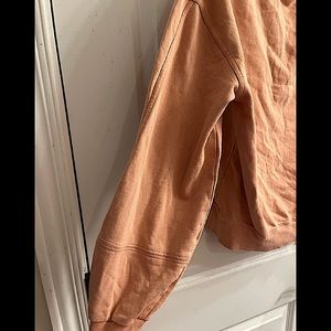 selling a v neck sweater from target… color is like a pinky orange